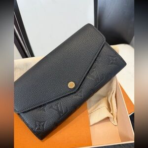 Louis Vuitton Monogram Empreinte leather Sarah Wallet